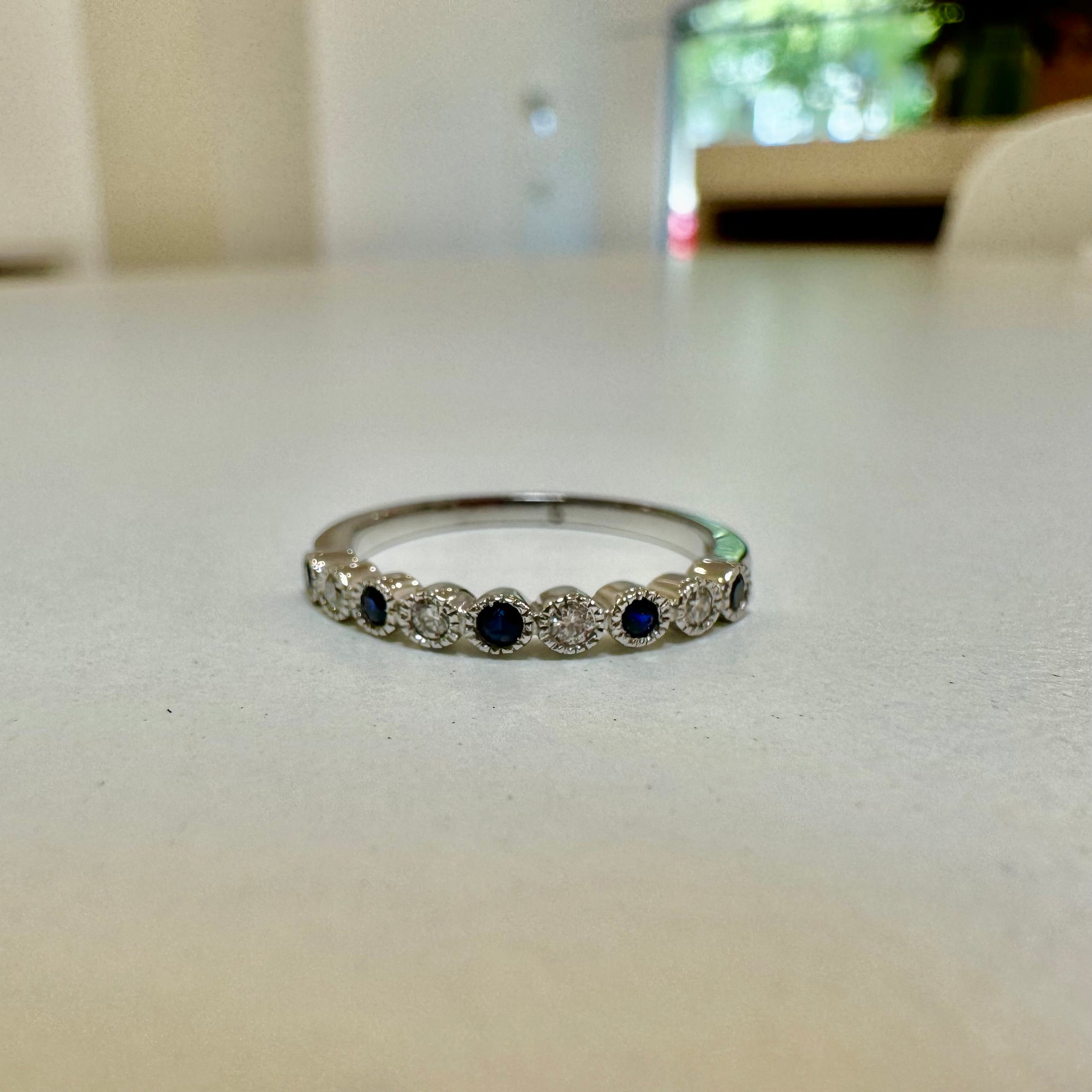 Sapphire and Diamond Round bezel set eternity