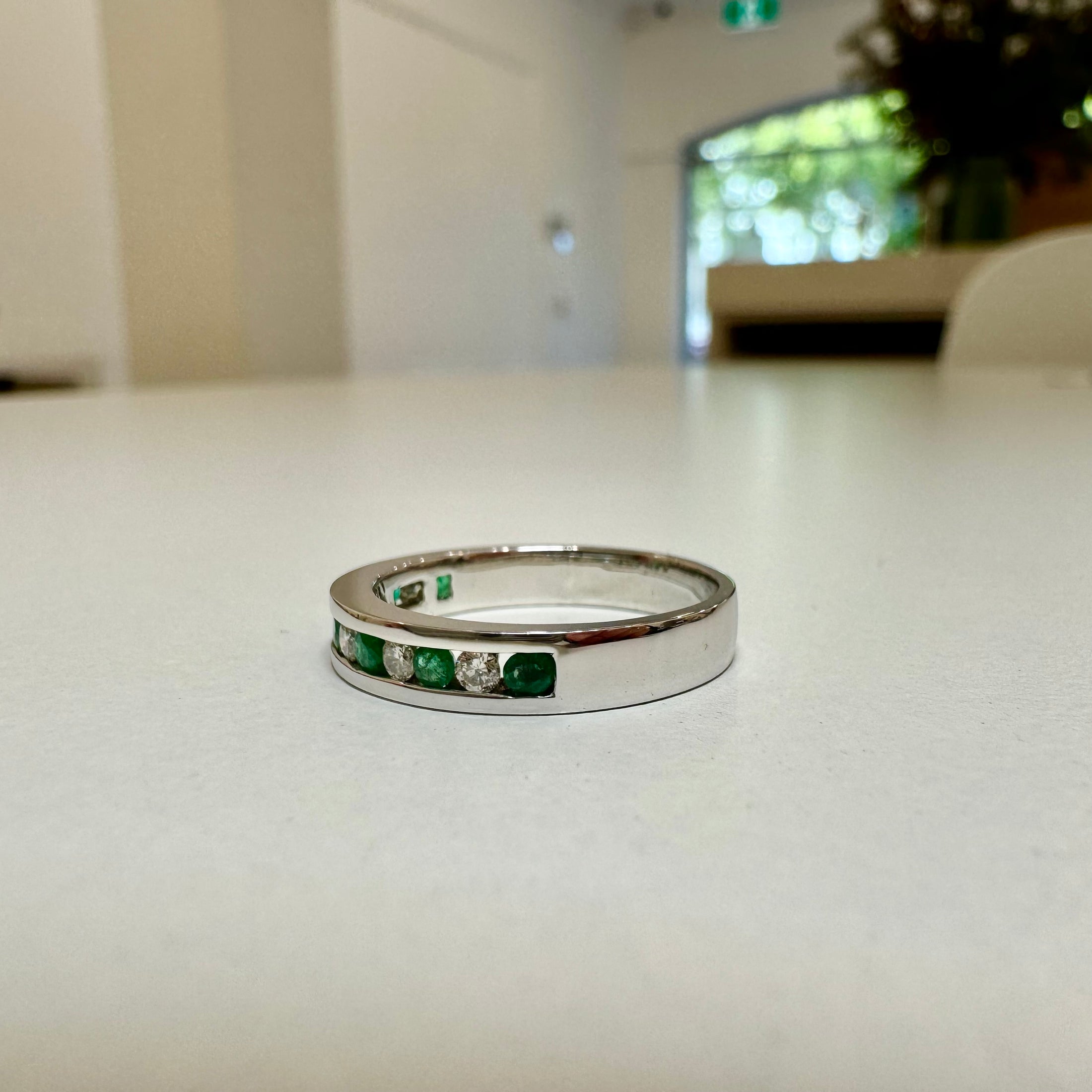 Diamond and emerald channel set