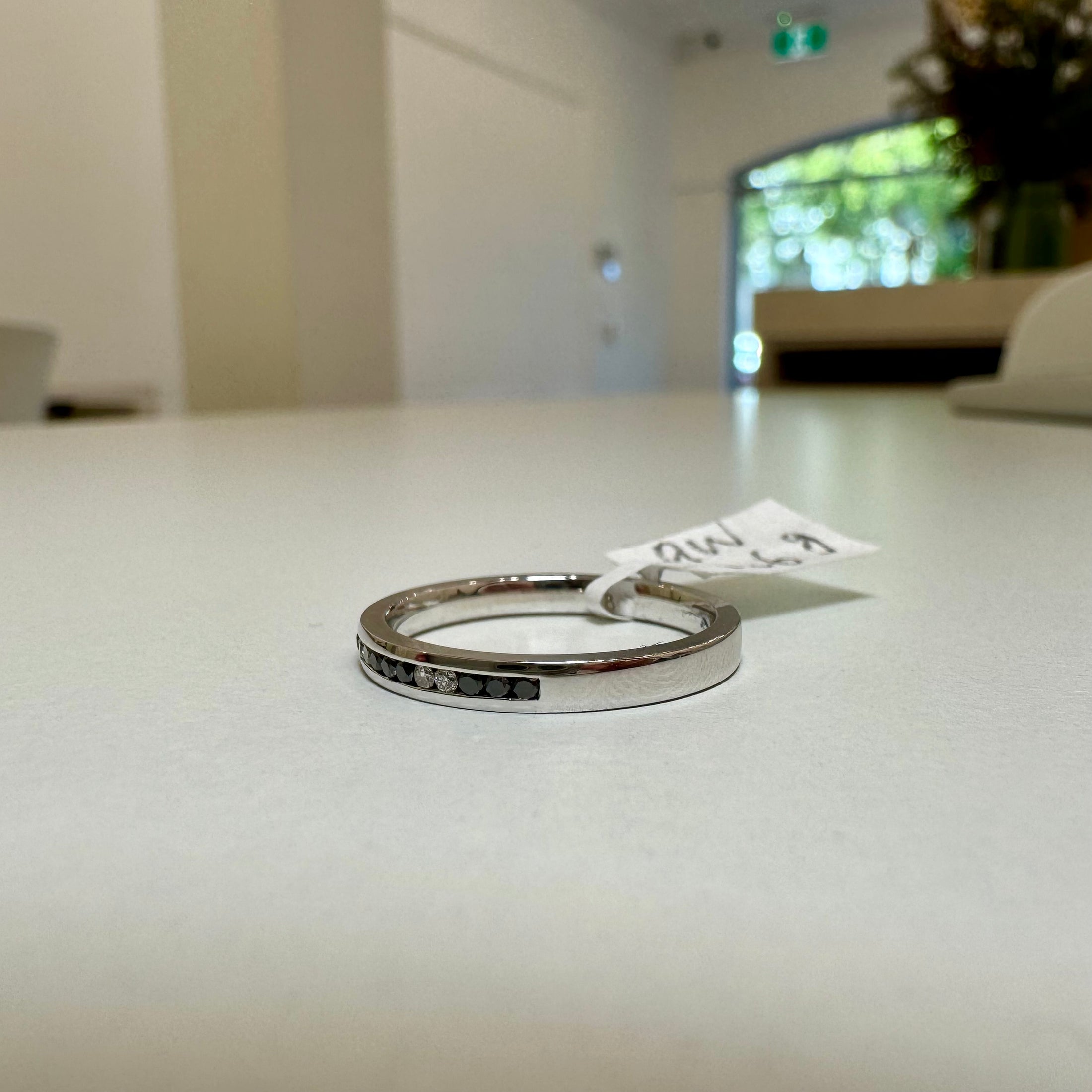 9ct. White gold black and white diamond