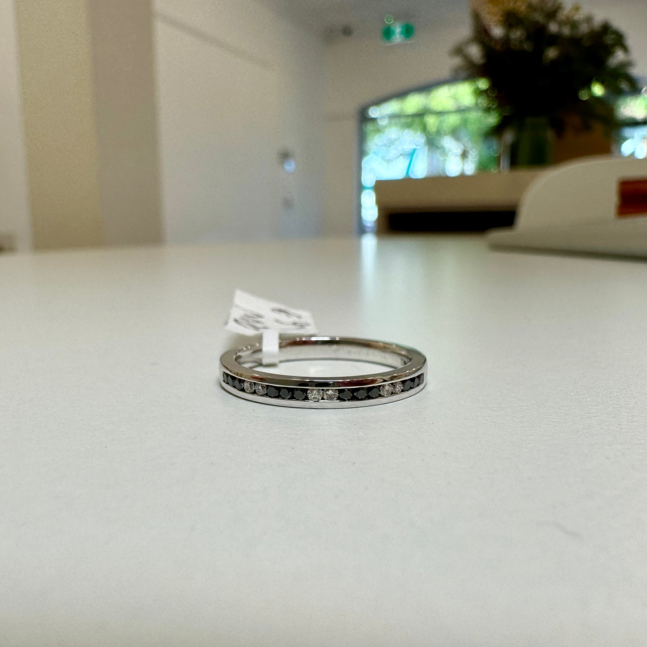 9ct. White gold black and white diamond