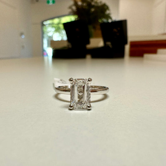 1.51ct. Emerald cut diamond halo