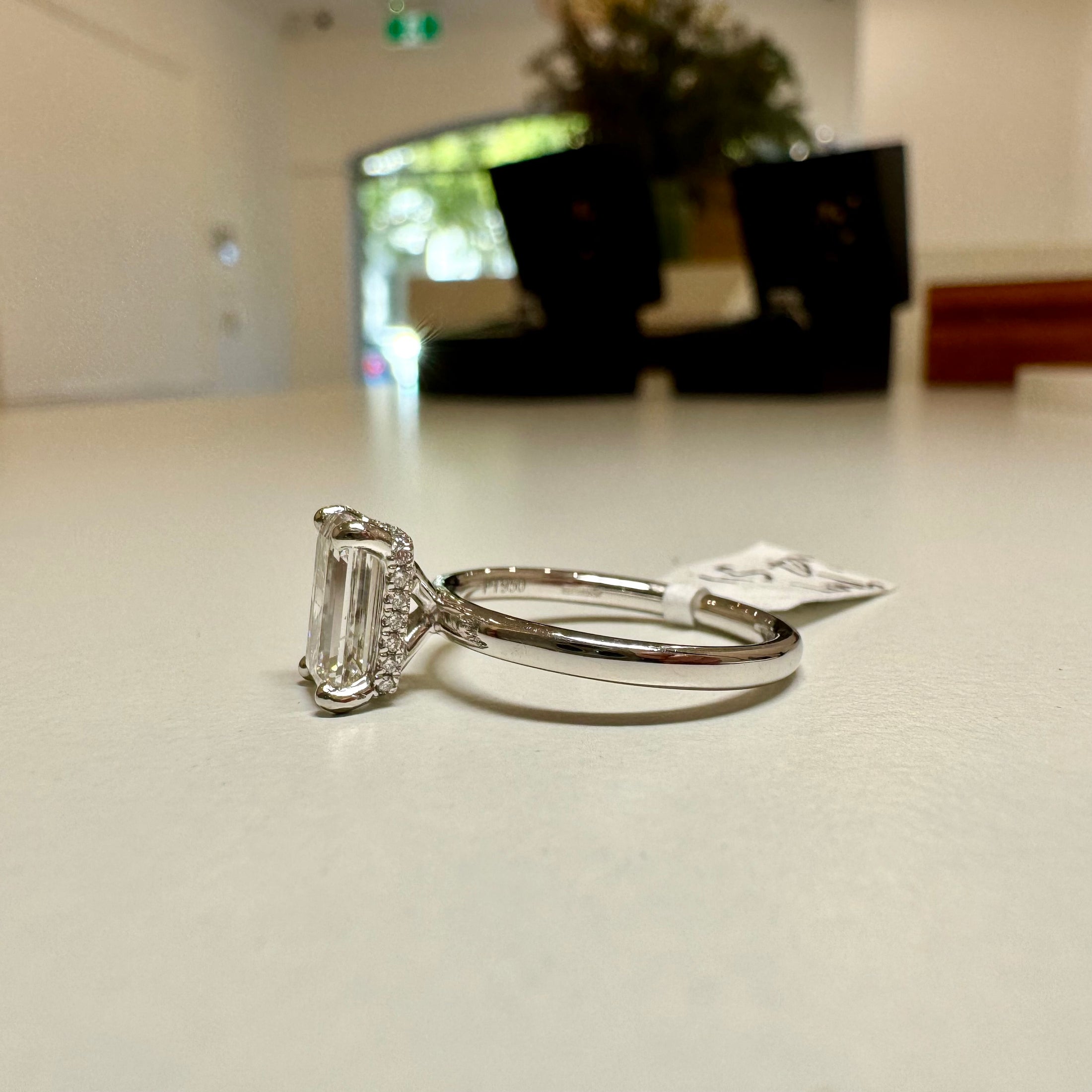 1.51ct. Emerald cut diamond halo