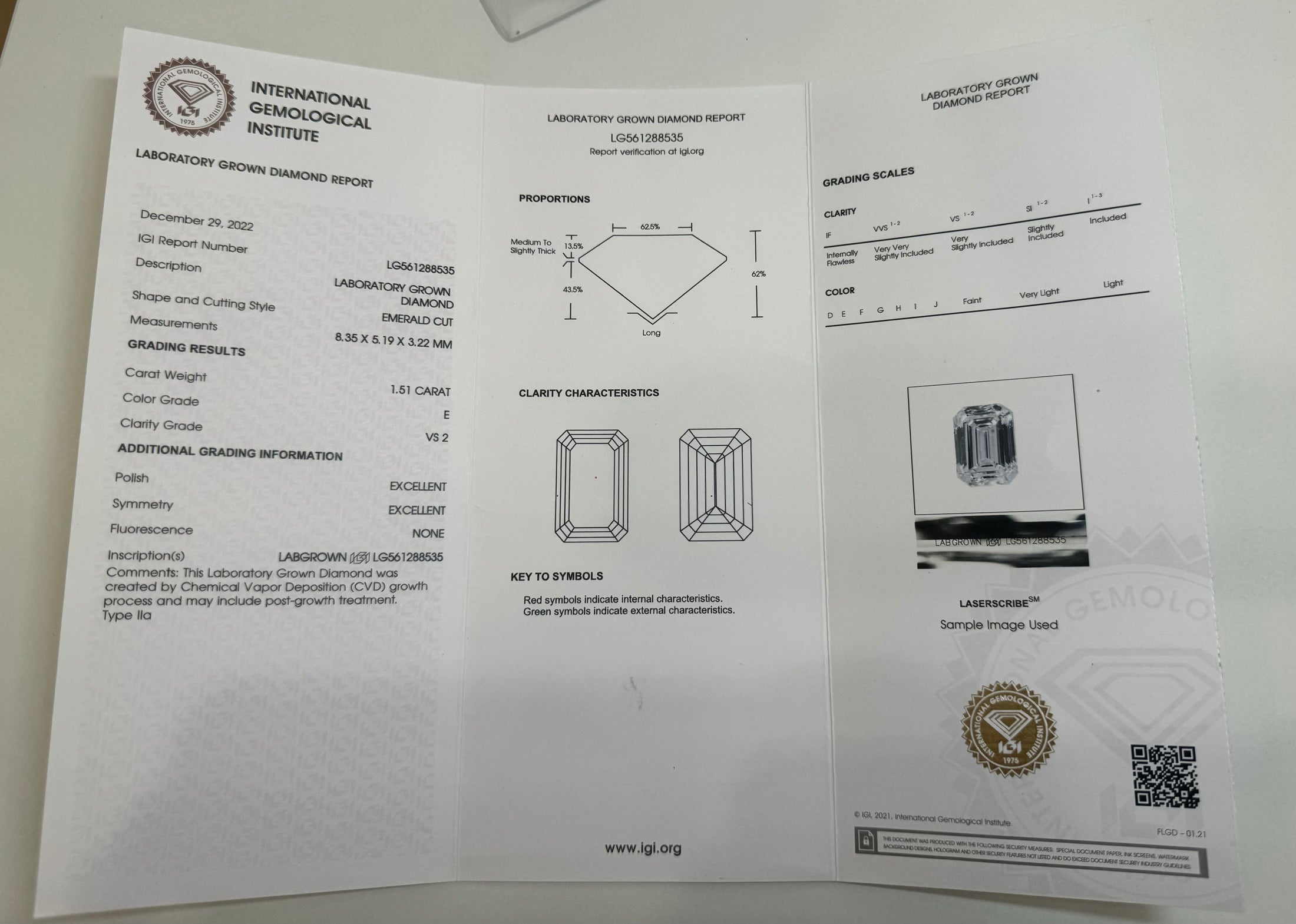 1.51ct. Emerald cut diamond halo