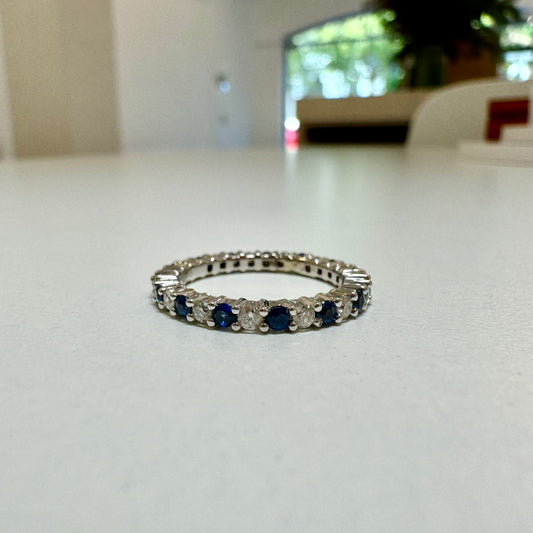 Sapphire and diamond full eternity claw